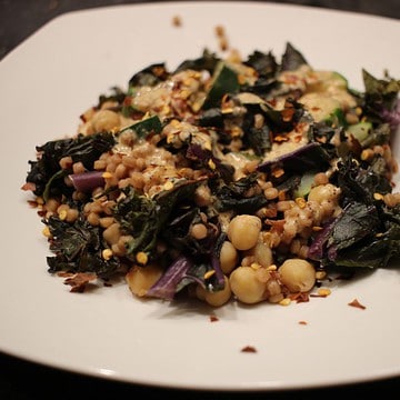 Pearl couscous with zucchini and red kale