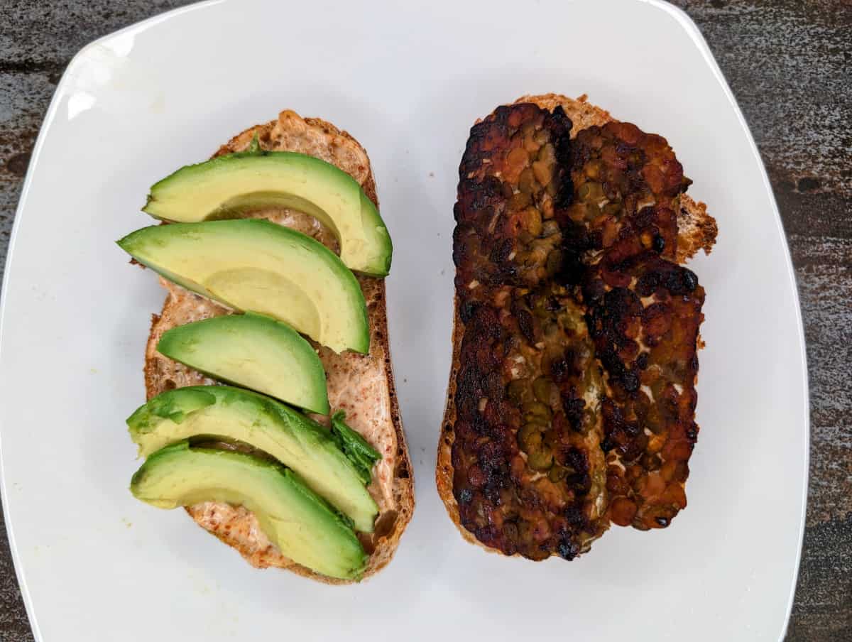 Smoked Tempeh Sandwich with Avocado, open-faced.