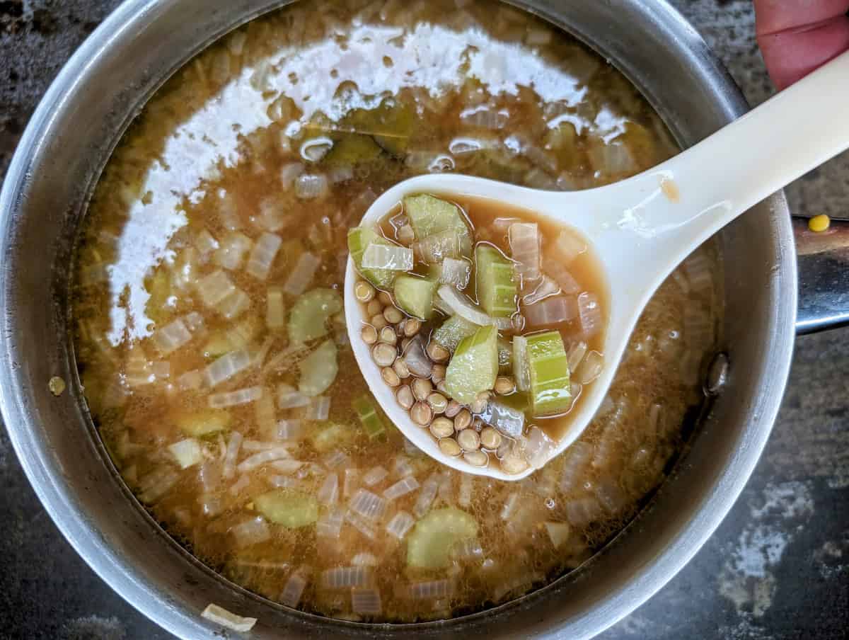 Lentil Soup with Miso, in pan with miso added.