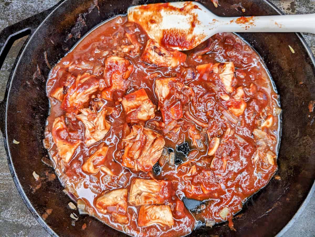 Sloppy Jacks, in pan, adding BBQ sauce.