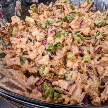 Seitan tahini salad, with onions and jalapeños.