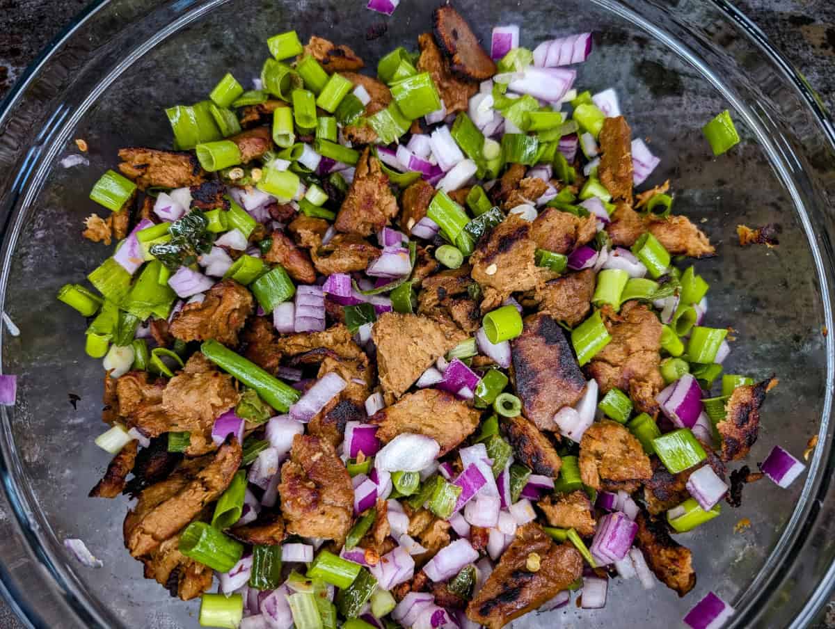 Mix the onions with the browned seitan.