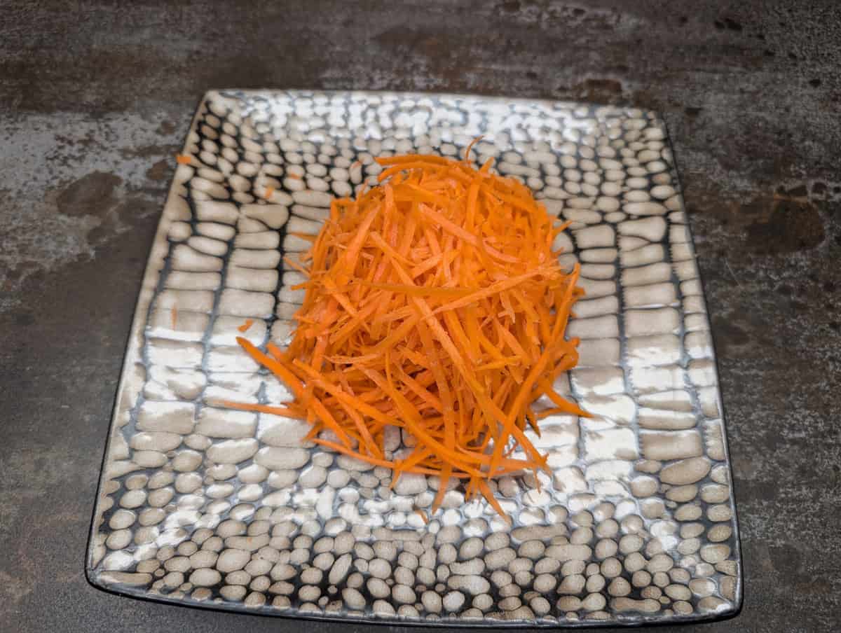 Bibimbap, step 4, julienne or cut the carrots into thin coins