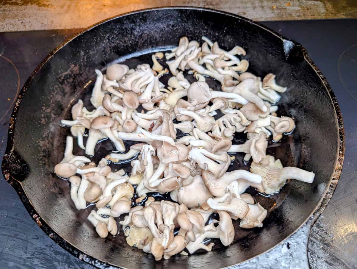 Bibimbap, step 6, heat pan until hot, add oil, add mushrooms