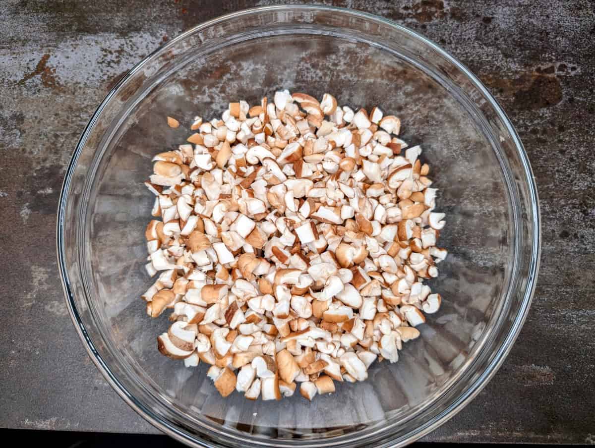 Step 2, chop mushrooms and place in a bowl