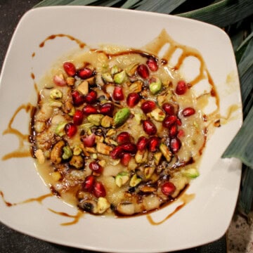 Black-eyed pea, yellow split pea, leek soup, topped with pomegranate seeds, pistachios, and pomegranate molasses.