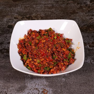 Calabrian pepper tapenade in a white bowl
