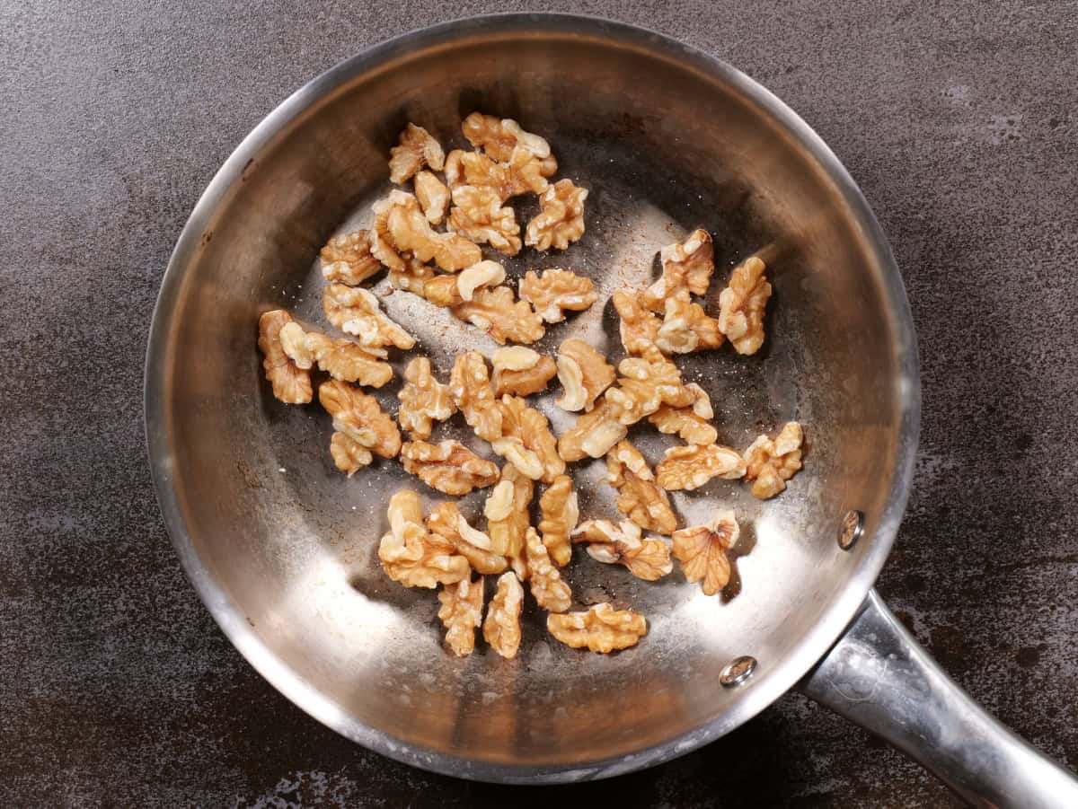whole walnuts in pan