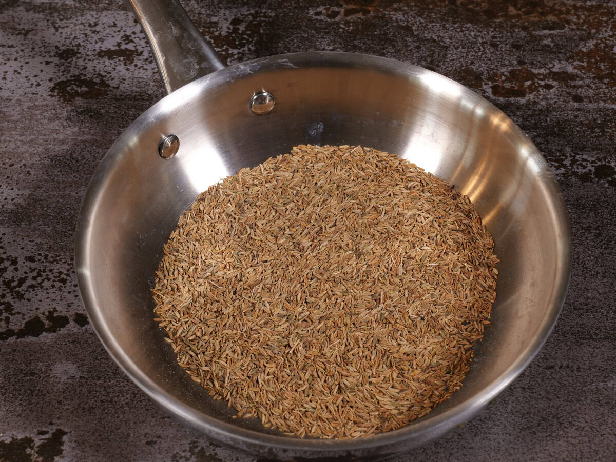 Step 5, za'atar seasoning mix. Place cumin seeds into a pan. Toast over low heat, until a few shades darker.