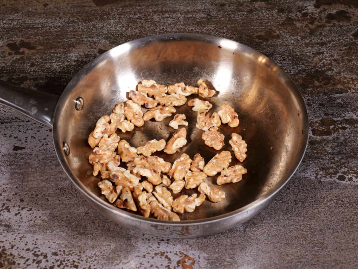toasted walnuts in a pan