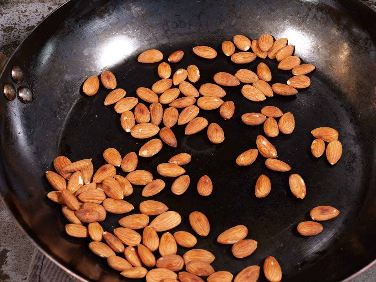 Romesco sauce, step 2, remove almonds from heat after they have browned.