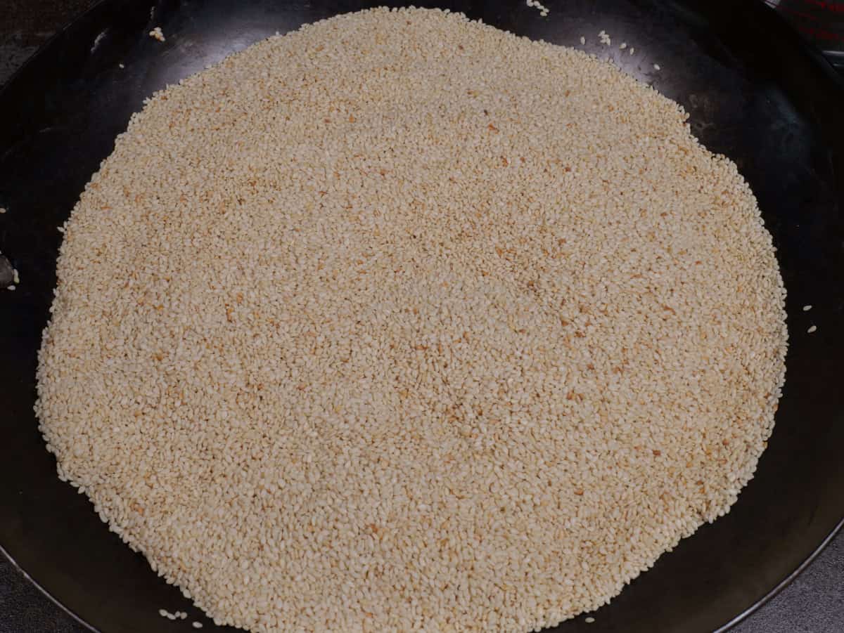 the sesame seeds in the pan after toasting