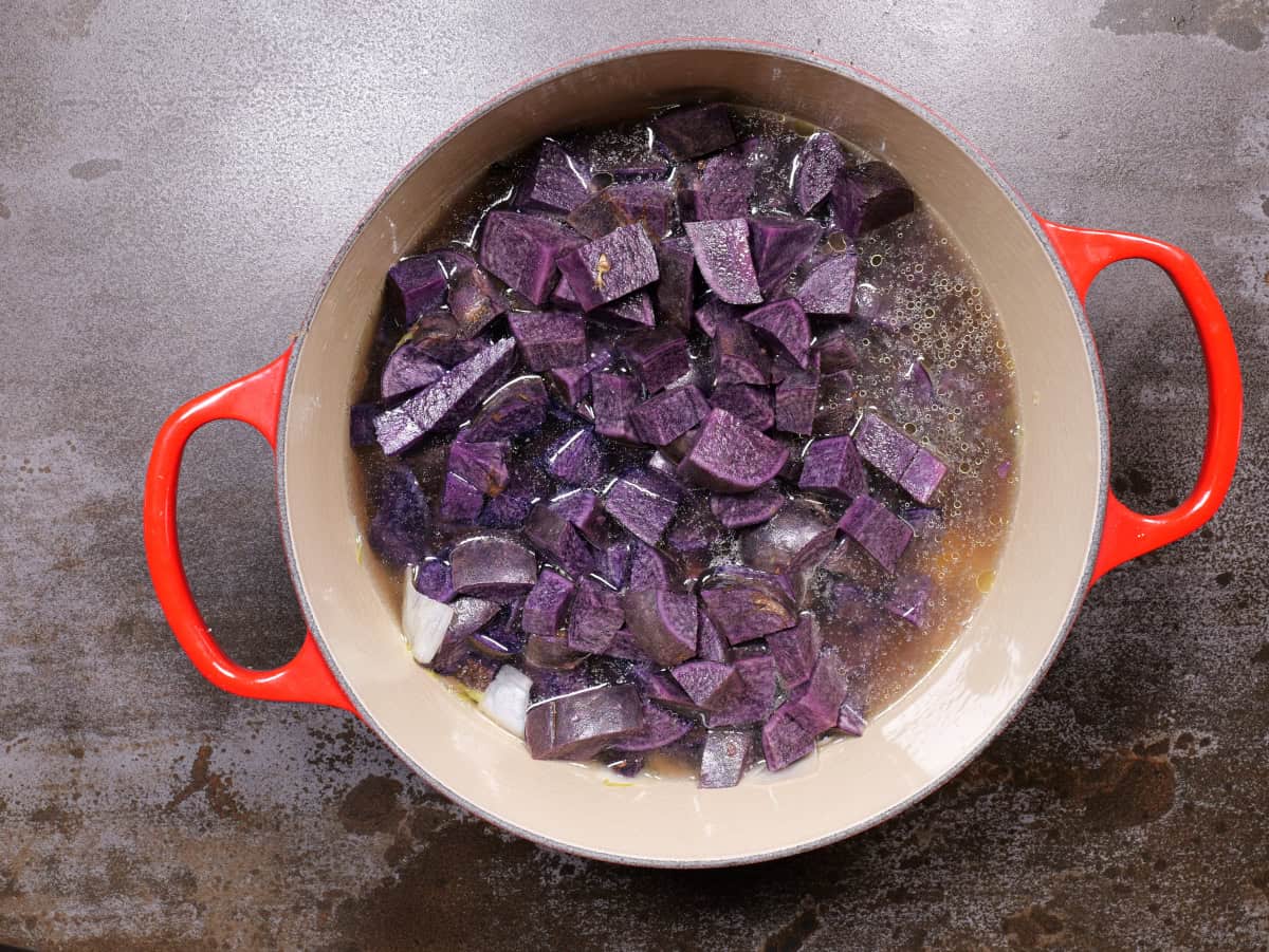 potatoes and broth added to pot