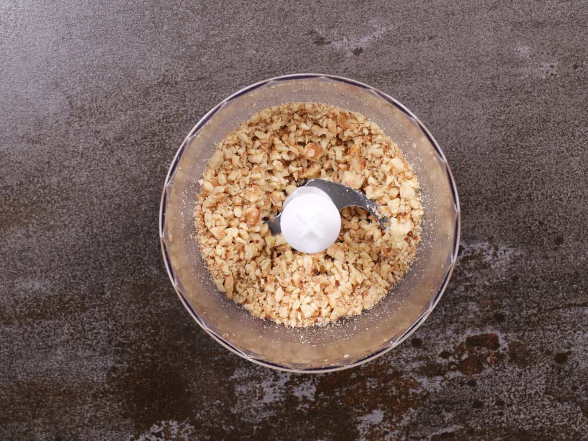 chopped walnuts in food processor