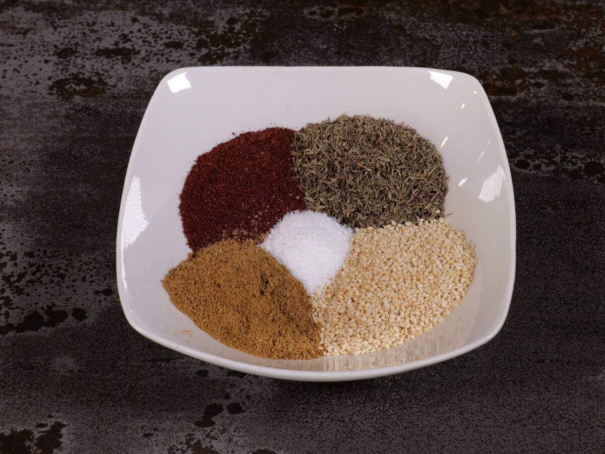 Step 5, za'atar seasoning mix. Place all ingredients into a bowl and mix!