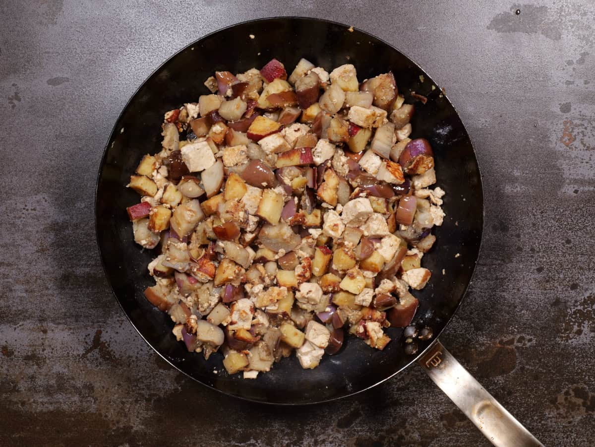 the tofu, sweet potato, eggplant scramble fully cooked in the pan