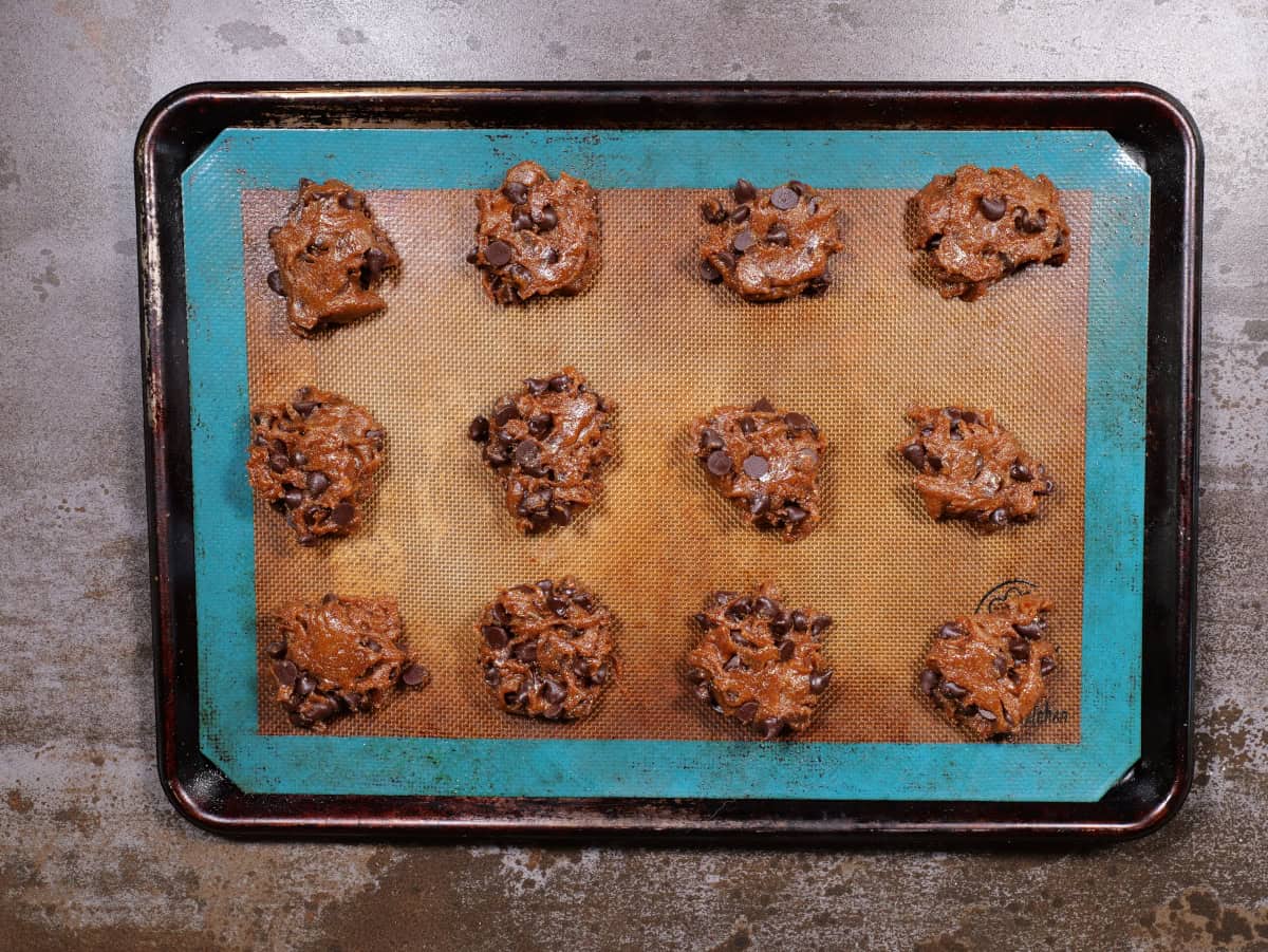 the chickpea chocolate chip cookie batter on the baking sheet