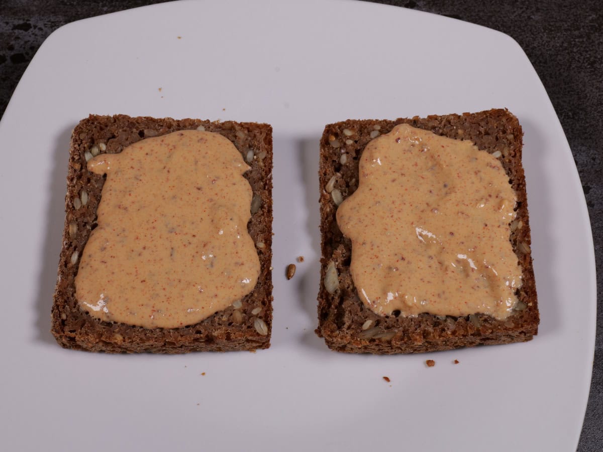Tahini/lemon/garlic sauce on rye bread.