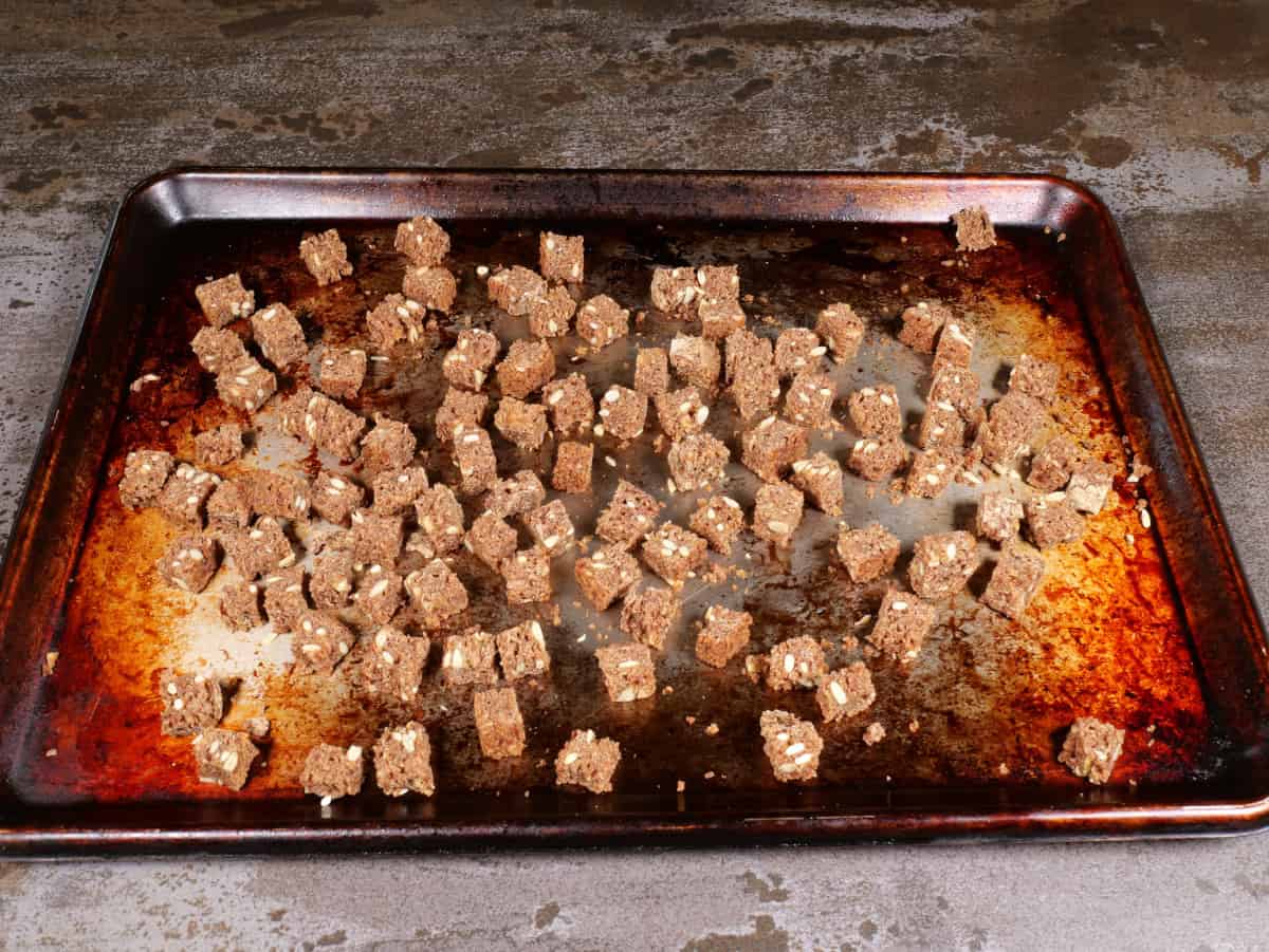 bread cubes on a tray after drying