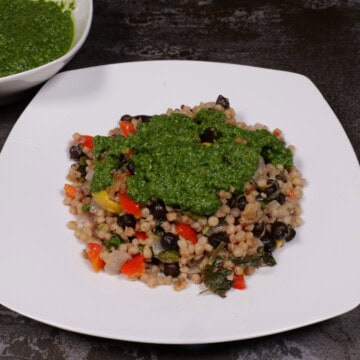 Zhug over couscous and black chickpeas