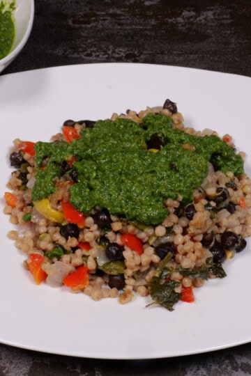 Zhug over couscous and black chickpeas