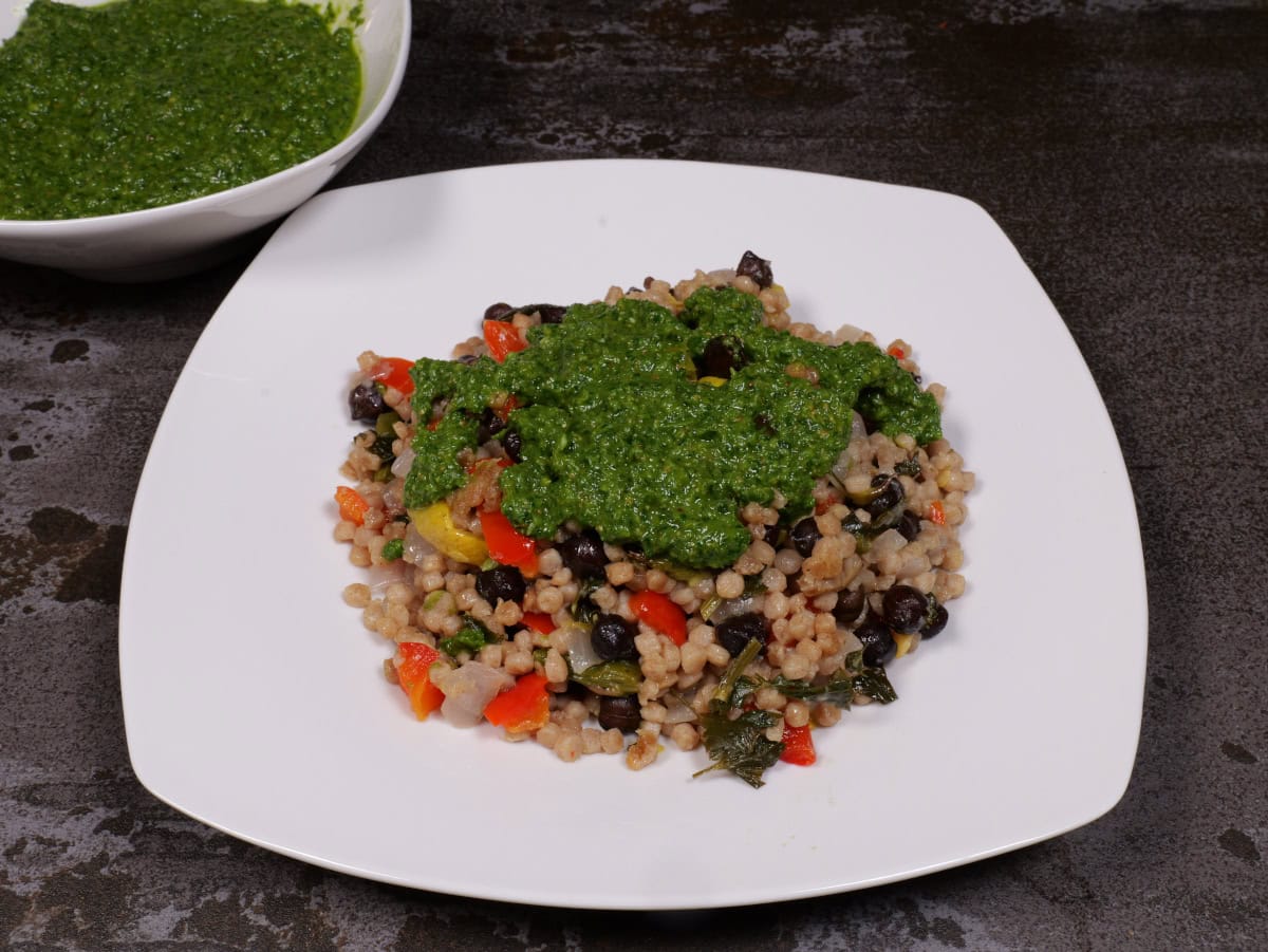 Zhug over couscous and black chickpeas