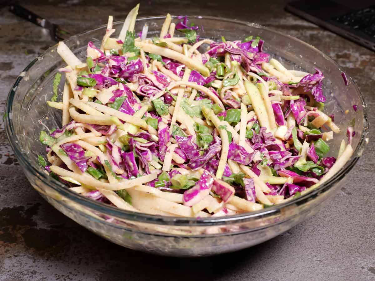 The asian salad mixed with the almond dressing